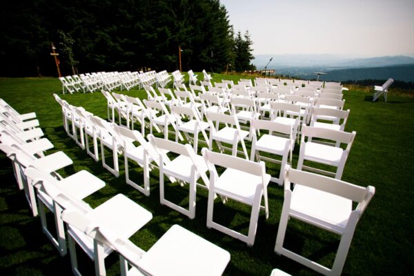 3 White Folding Chairs